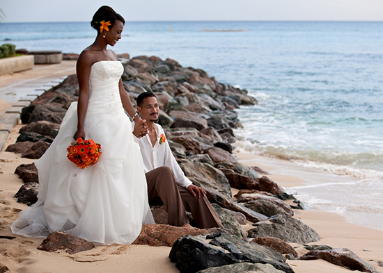 Couple enjoying a moment by the beautiful boardwalk just outside the Beach House Restaurant
